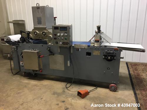 https://ww2.aaronequipment.com/Images/ItemImages/Bakery-Equipment/Bakery-Equipment/APV-Frozen-Cookie-Dough-Machine_43947003_aa.jpg