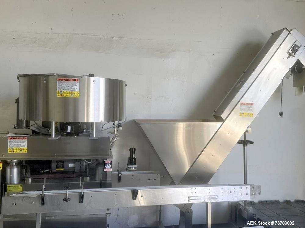 https://ww2.aaronequipment.com/Images/ItemImages/Packaging-Equipment/Cappers-Quill-Automatic-Inline/Kapsall-A6_73703002_aa.jpg