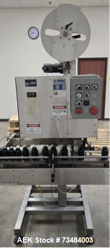 https://ww2.aaronequipment.com/Images/ItemImages/Packaging-Equipment/Cappers-Tamper-Evident-Neck-Banders/PDC-40-M_73484003_aa.png