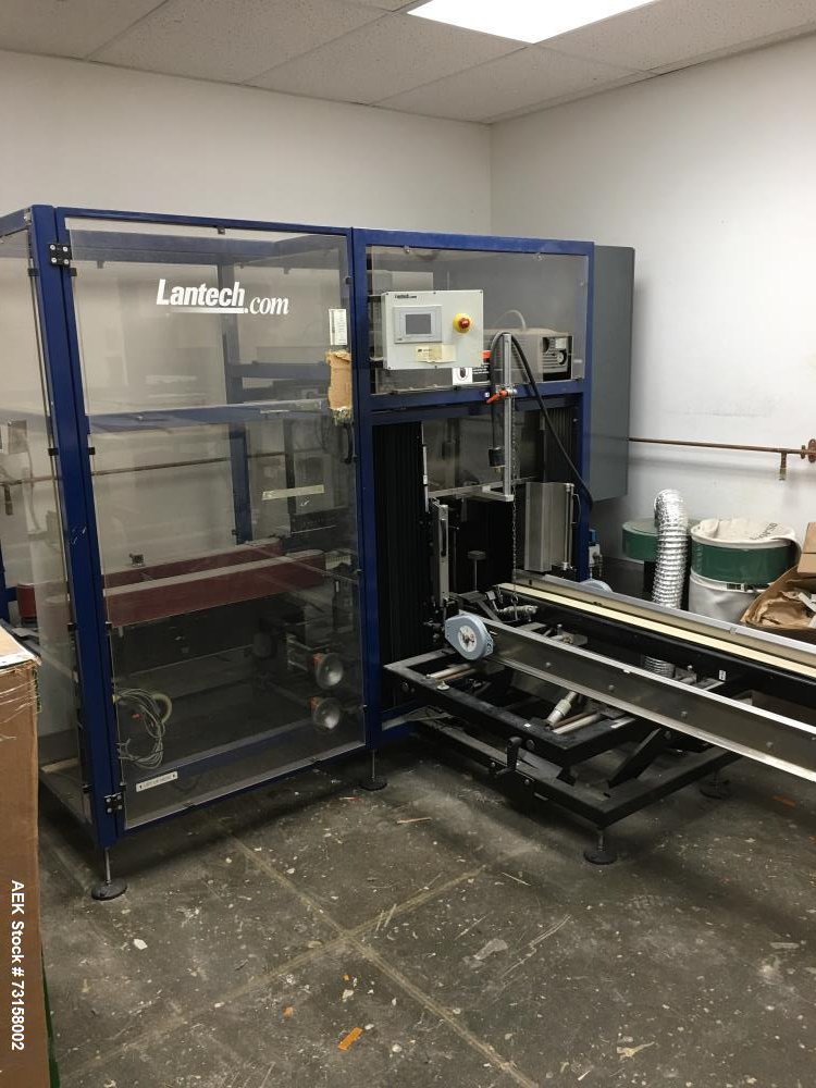 https://ww2.aaronequipment.com/Images/ItemImages/Packaging-Equipment/Case-Erectors-Tape-Bottom-Seal/Lantech-C-1000-Tape_73158002_aa.jpg