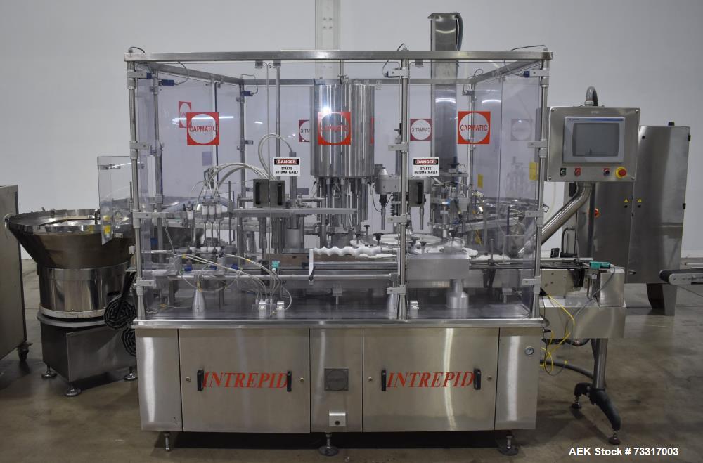 https://ww2.aaronequipment.com/Images/ItemImages/Packaging-Equipment/Fillers-Liquid-Monoblock/Capmatic-F4-A-X-PP-222_73317003_aa.jpg