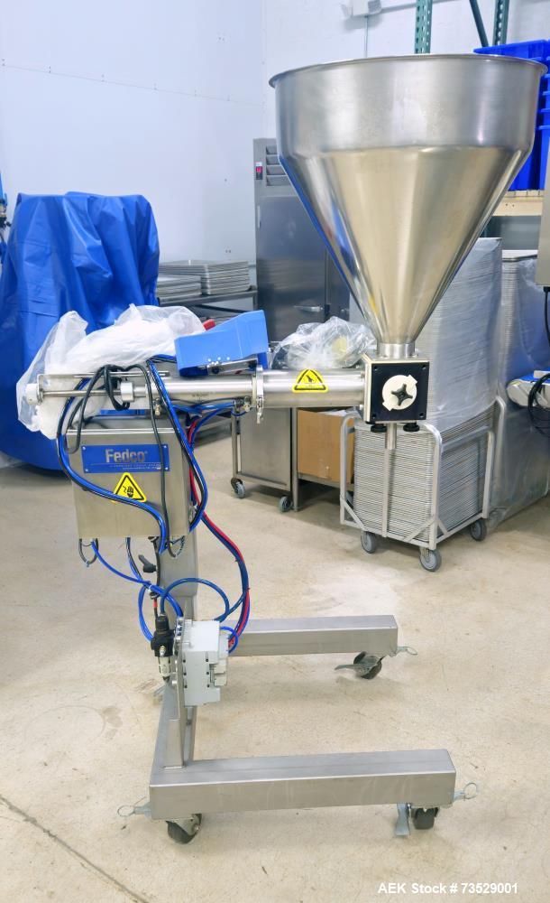 https://ww2.aaronequipment.com/Images/ItemImages/Packaging-Equipment/Fillers-Piston-Inline/Depositor_73529001_aa.jpg