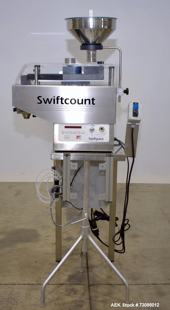 https://ww2.aaronequipment.com/Images/ItemImages/Packaging-Equipment/Fillers-Tablet-Capsule-Electronic-Channel-Counters/Swiftpack-SwiftCount_73095012_aa.jpg