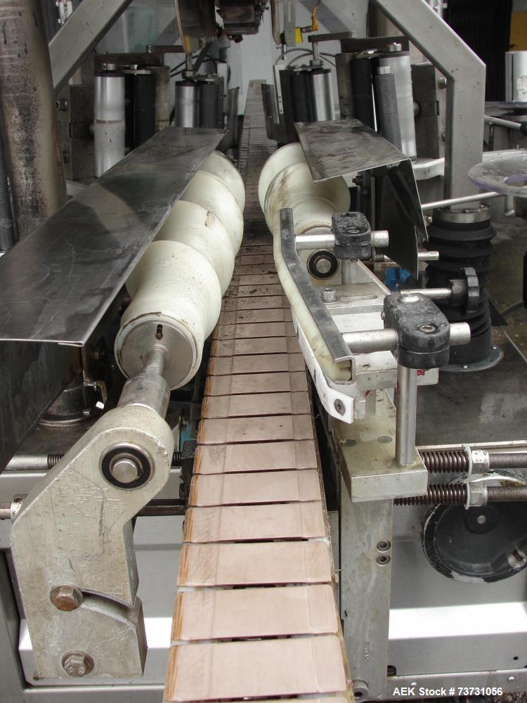https://ww2.aaronequipment.com/Images/ItemImages/Packaging-Equipment/Labelers-Pressure-Sensitive-Front-and-Back/Shorewood-4100_73731056_ac.jpg