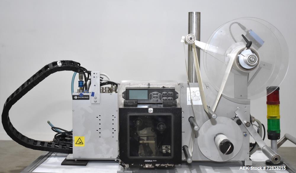 https://ww2.aaronequipment.com/Images/ItemImages/Packaging-Equipment/Labelers-Pressure-Sensitive-Print-and-Apply/Domino-T100-Right_72834015_aa.jpg