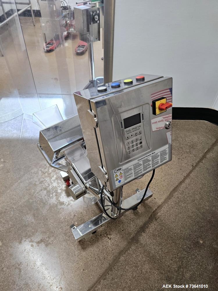https://ww2.aaronequipment.com/Images/ItemImages/Packaging-Equipment/Metal-Detectors-Tablet-Capsule/CEIA-THS-PH21N_73641010_aa.jpg