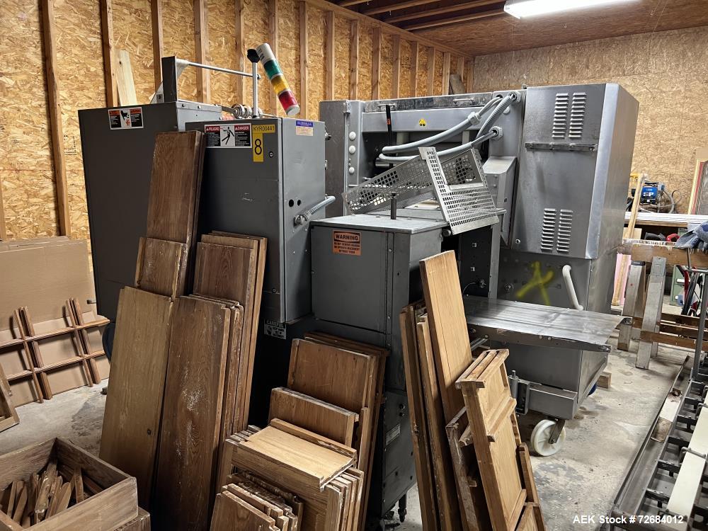 https://ww2.aaronequipment.com/Images/ItemImages/Packaging-Equipment/Shrink-Equipment-Horizontal-Lap-Sealers/Doboy-Super-Must_72684012_aa.jpg