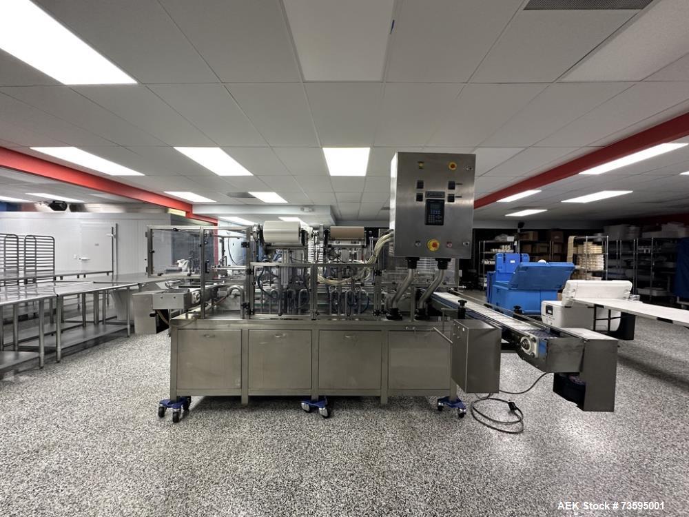 https://ww2.aaronequipment.com/Images/ItemImages/Packaging-Equipment/Tray-Formers-and-Packers-Form-and-Pack/Pack-Line-PL-200_73595001_aa.jpeg